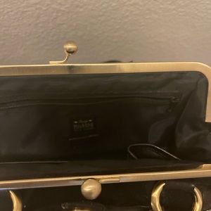 Lil Suede Black Bag , perfect accent to a vintage look.